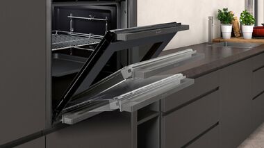 Духовые шкафы с убирающейся дверцей: Bosch или Neff?